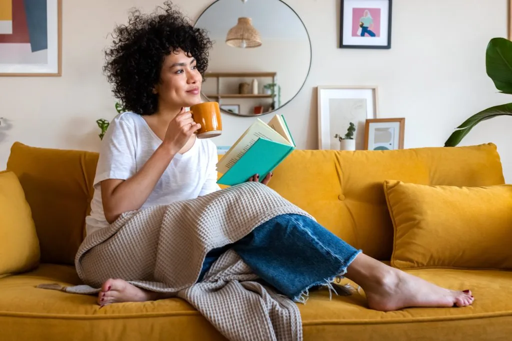 Relaxing at home with a warm drink